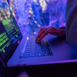 person using black laptop computer