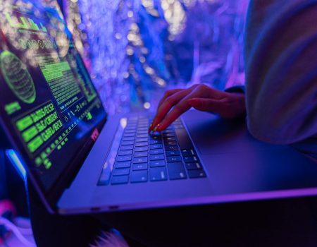 person using black laptop computer