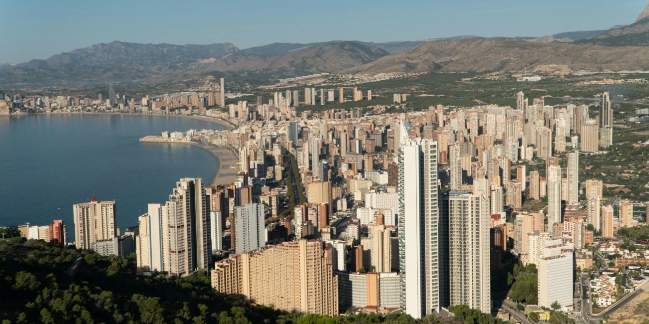 multirstory building built near sea in modern coastal city