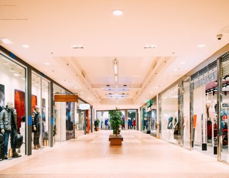 Shops with clothes at the modern shopping mall Shopping Centre