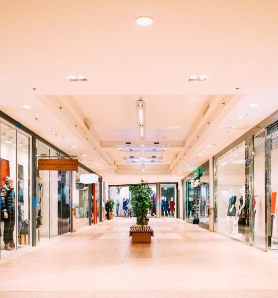 Shops with clothes at the modern shopping mall Shopping Centre