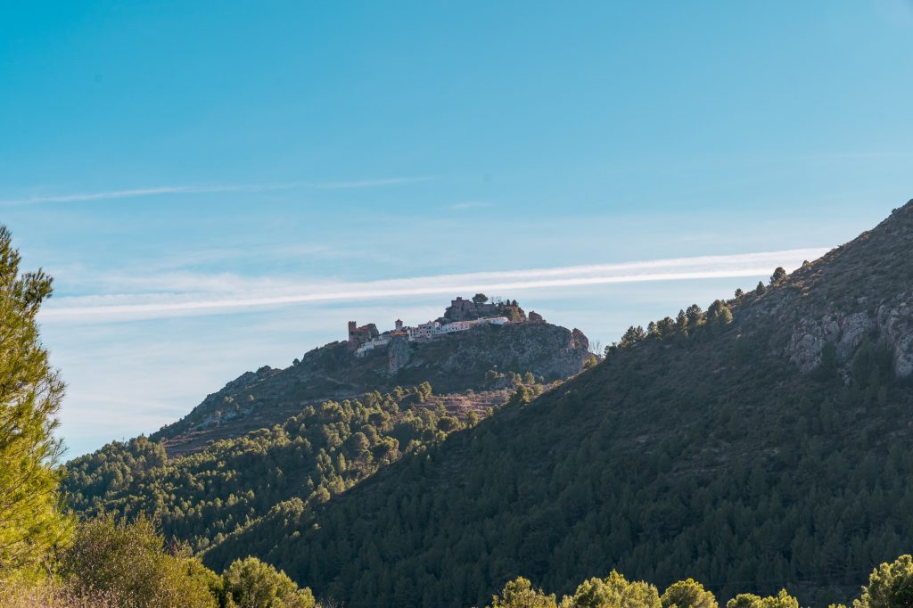 Town and castle of Guadalest from the reservoir of Guadalest in Alicante, Spain