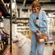 Woman visiting wine shop with her dog