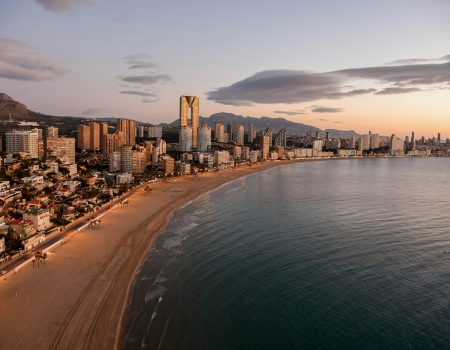 city skyline near body of water during daytime