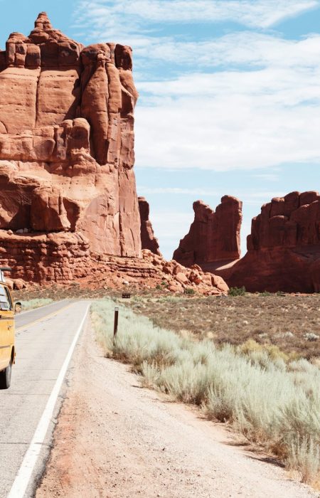 yellow Volkswagen van on road