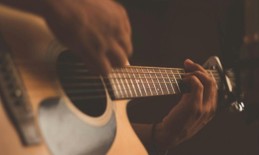 person playing guitar