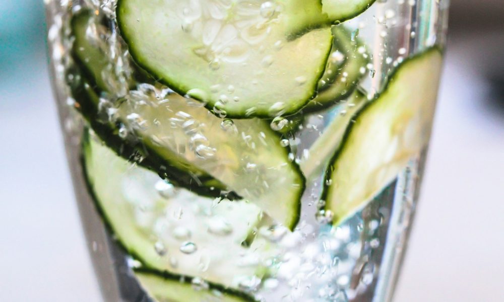 green vegetable on clear glass container