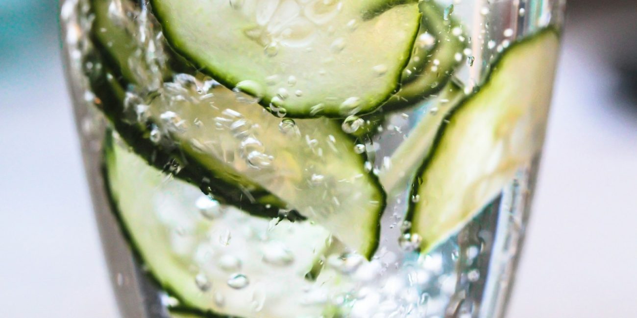 green vegetable on clear glass container