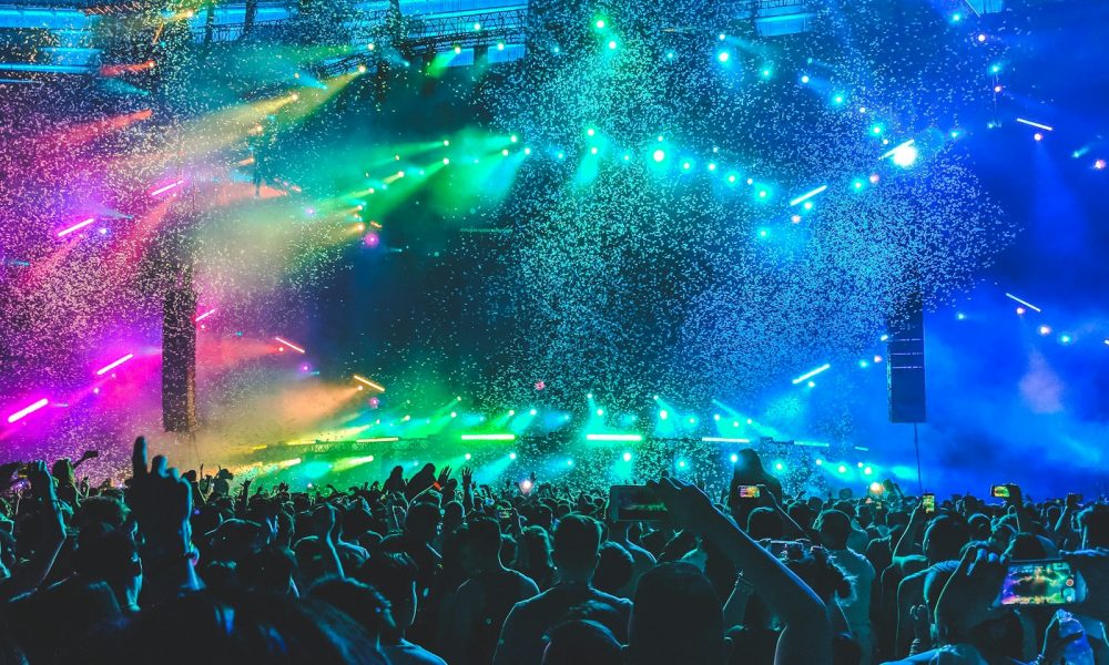 group of people in front of stage