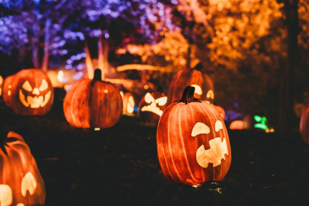 a group of carved pumpkins