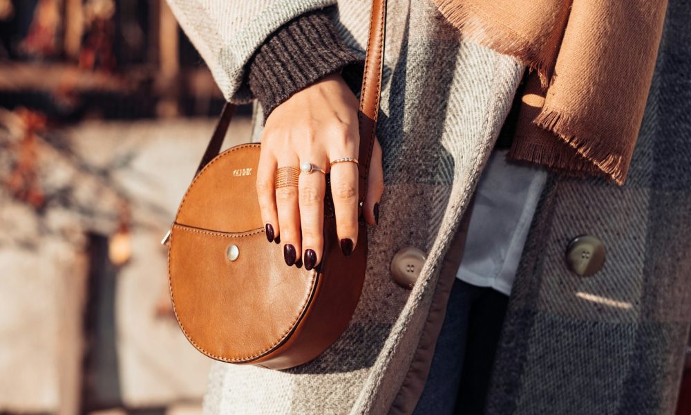 a person holding a purse
