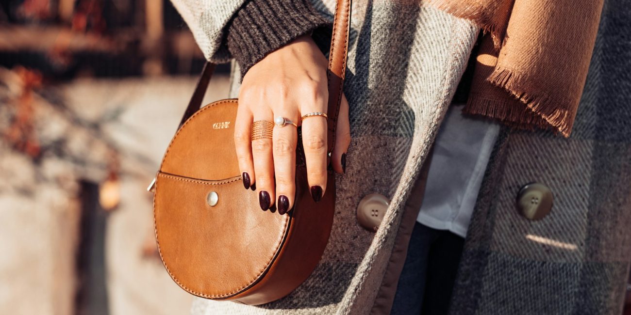 a person holding a purse
