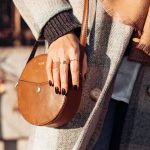 a person holding a purse