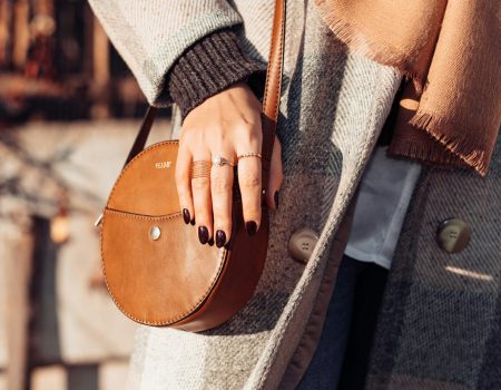 a person holding a purse