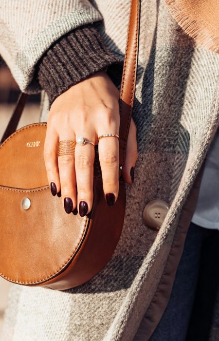 a person holding a purse