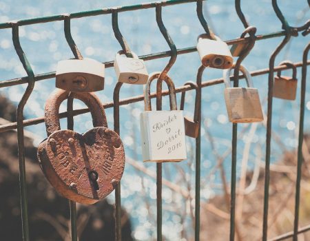 closeup photography of padlock at daytime