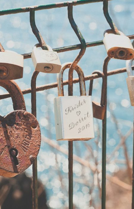 closeup photography of padlock at daytime