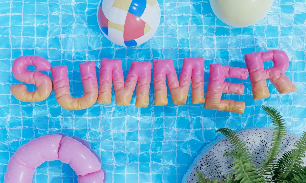a pool with a pool float, inflatable toys, and the word summer