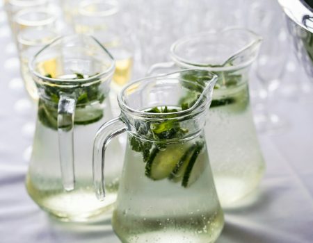 clear glass pitcher with content