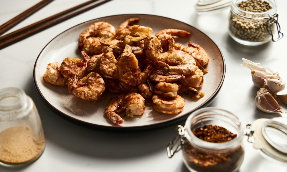 a plate of fried food on a table