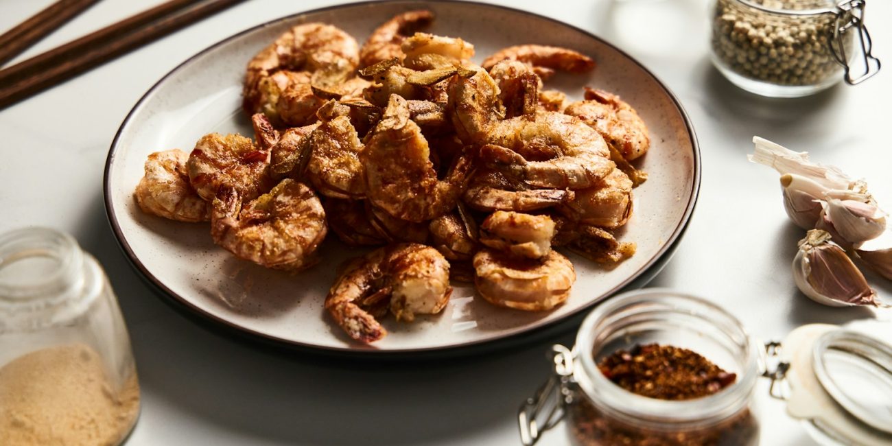a plate of fried food on a table