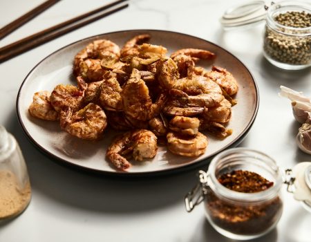a plate of fried food on a table