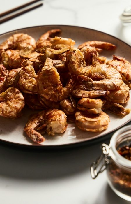 a plate of fried food on a table