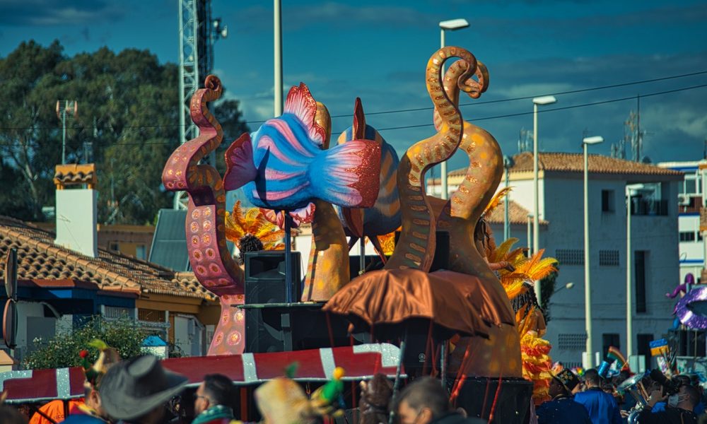 a group of people watching a parade float