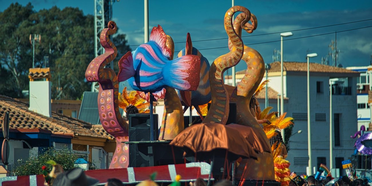 a group of people watching a parade float