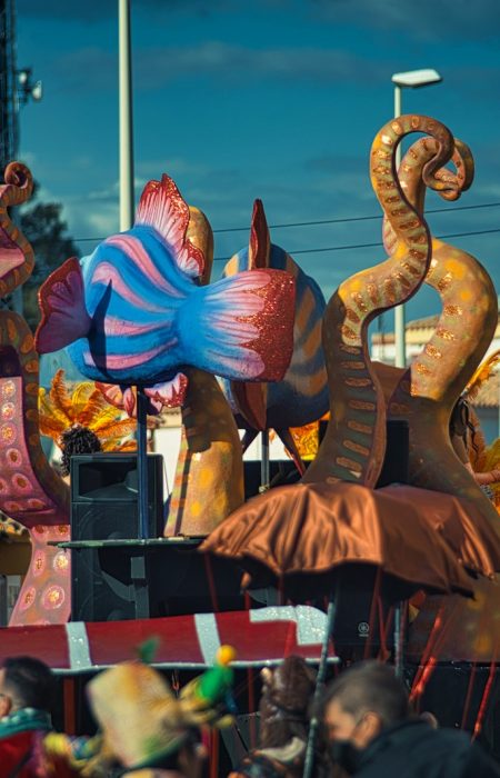a group of people watching a parade float