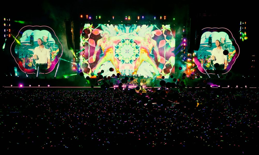 people standing in front of stage partying during nighttime
