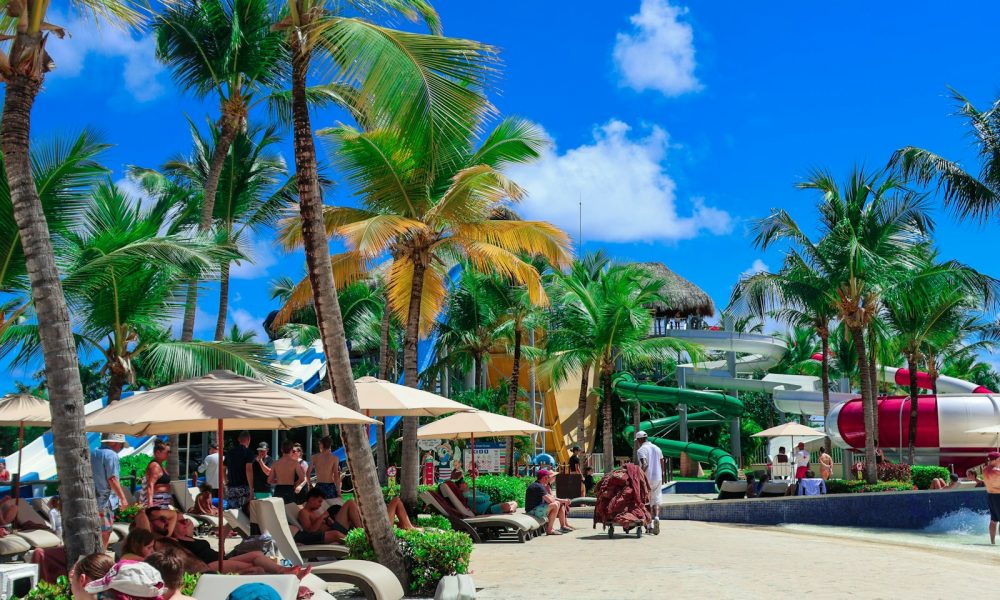 People are relaxing on a beautiful tropical beach.