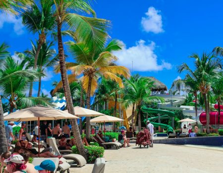 People are relaxing on a beautiful tropical beach.
