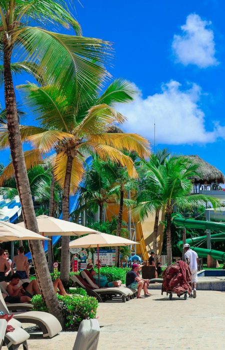 People are relaxing on a beautiful tropical beach.