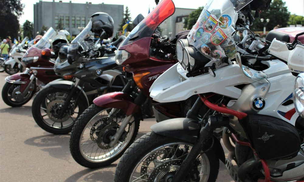 A row of motorcycles parked next to each other