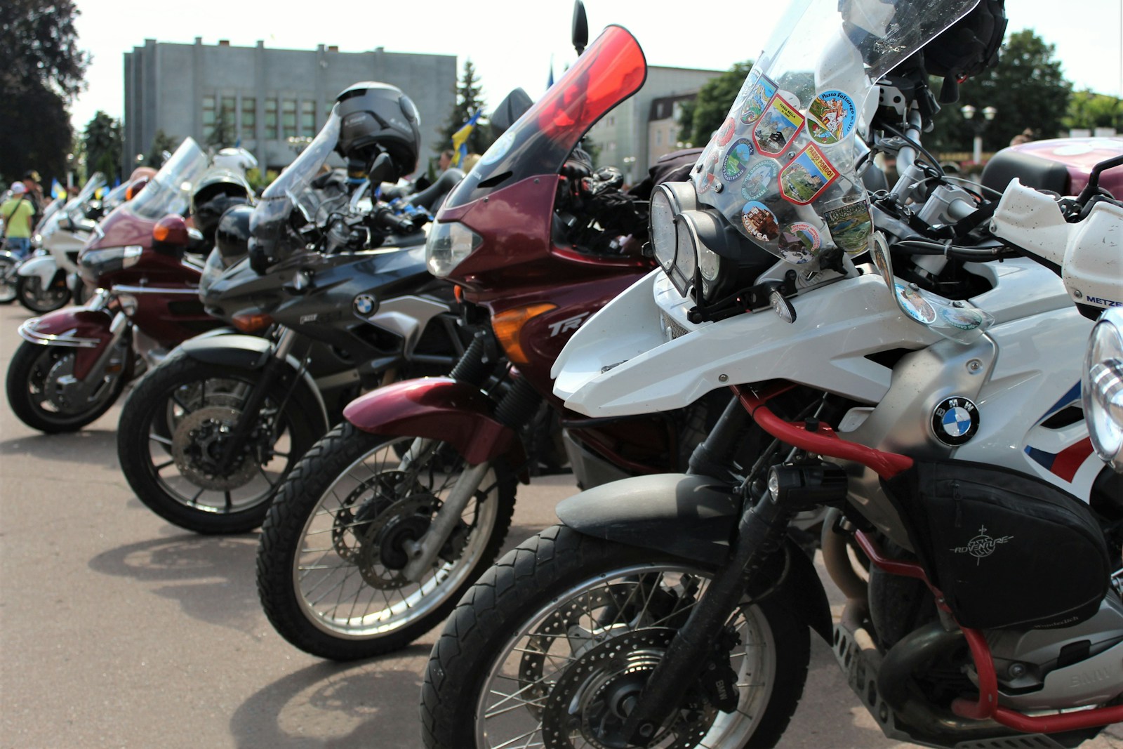 A row of motorcycles parked next to each other