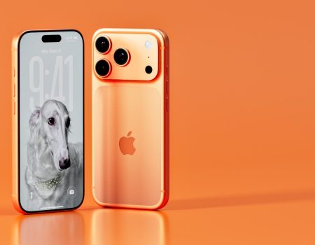 Two rose gold iphones on an orange background