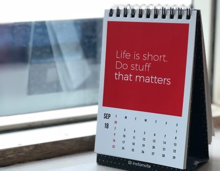 spiral freestanding calendar on white surface