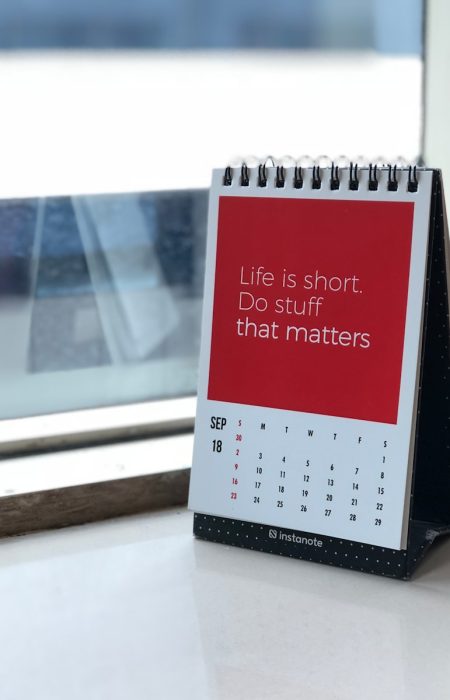 spiral freestanding calendar on white surface
