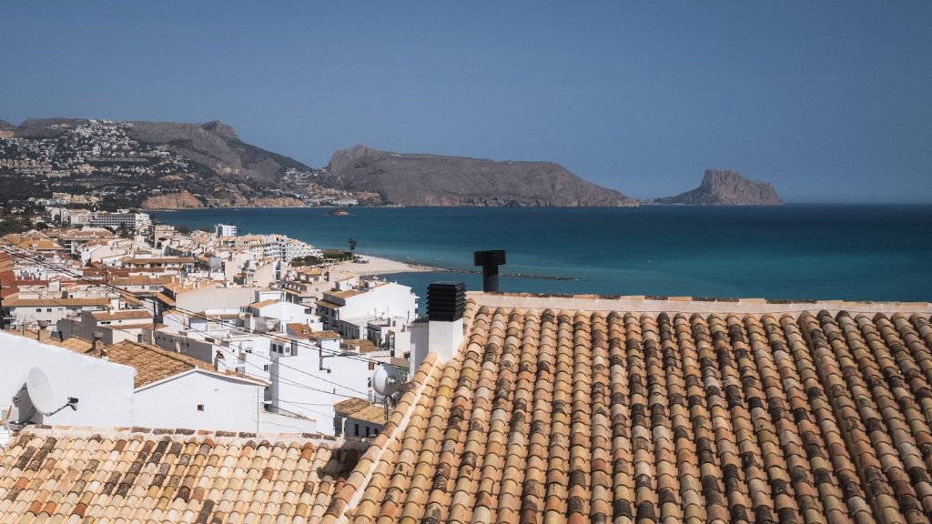 a view of a city next to a body of water