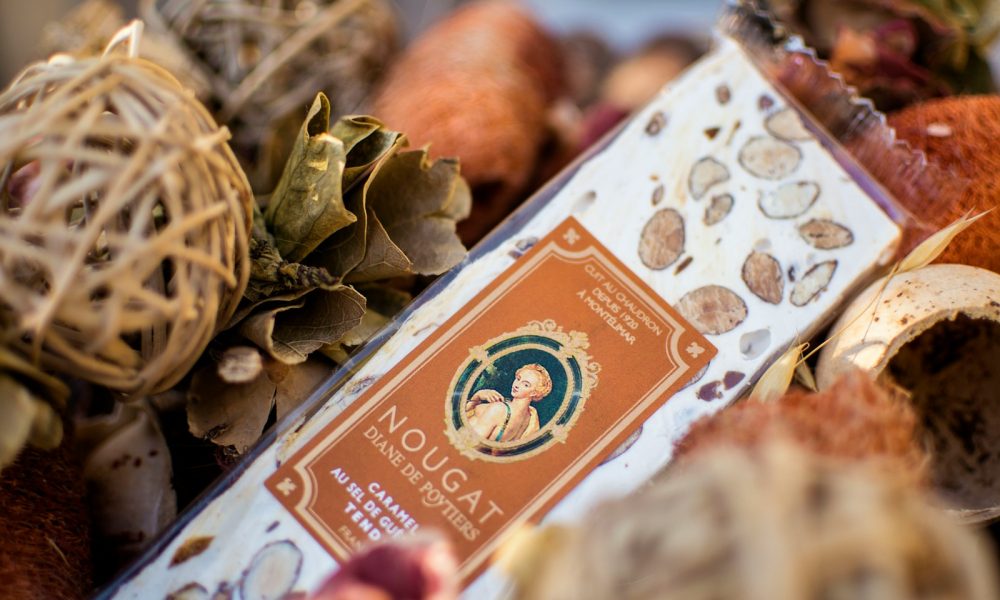 Nougat candy bar nestled among decorations.