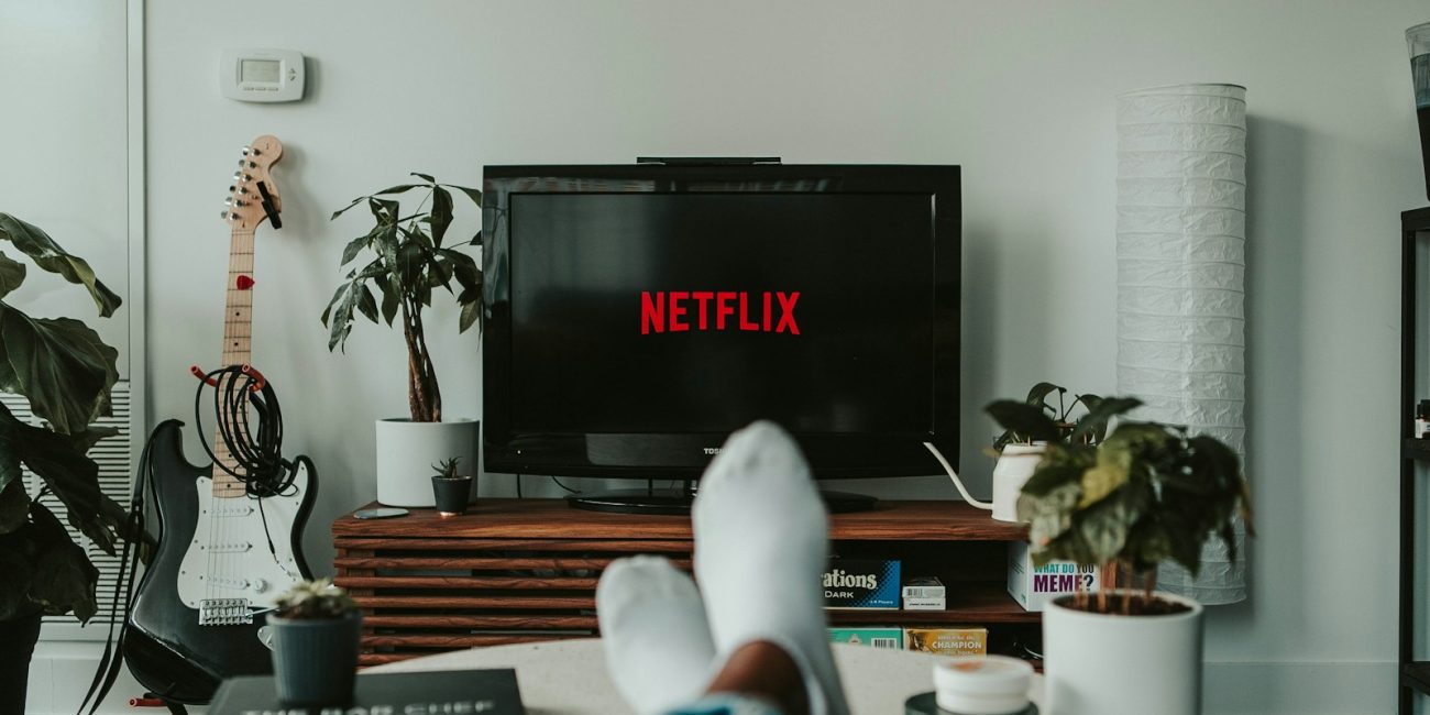 black flat screen tv turned on displaying 11