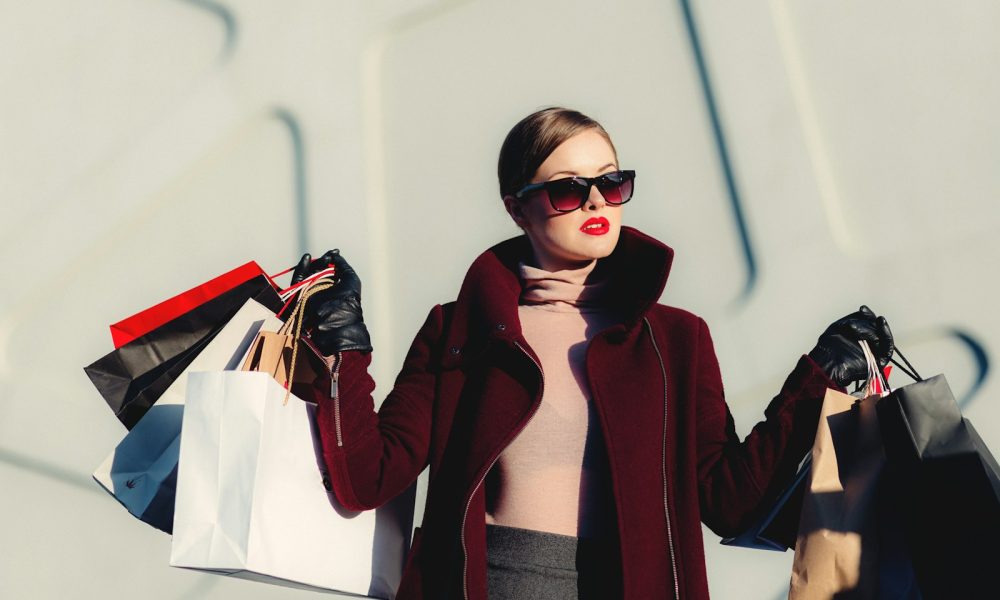 Get Ready to Shop! Benidorm’s Mega Outlet Fair is Back with Huge Discounts photo of woman holding white and black paper bags