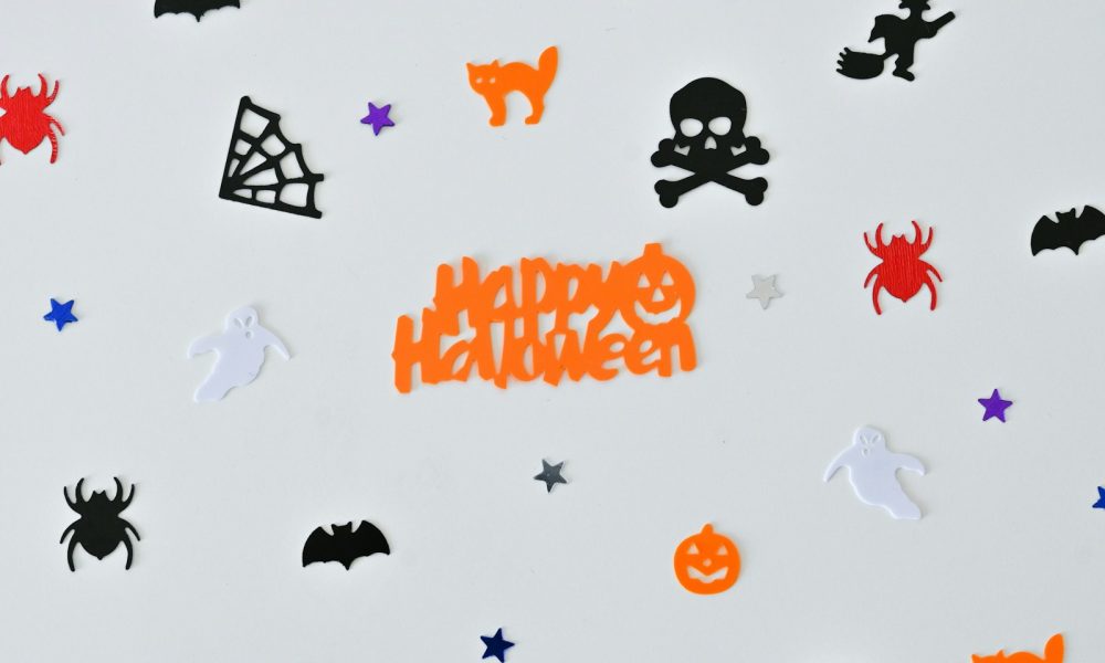 a white surface with black and orange text and a black outline