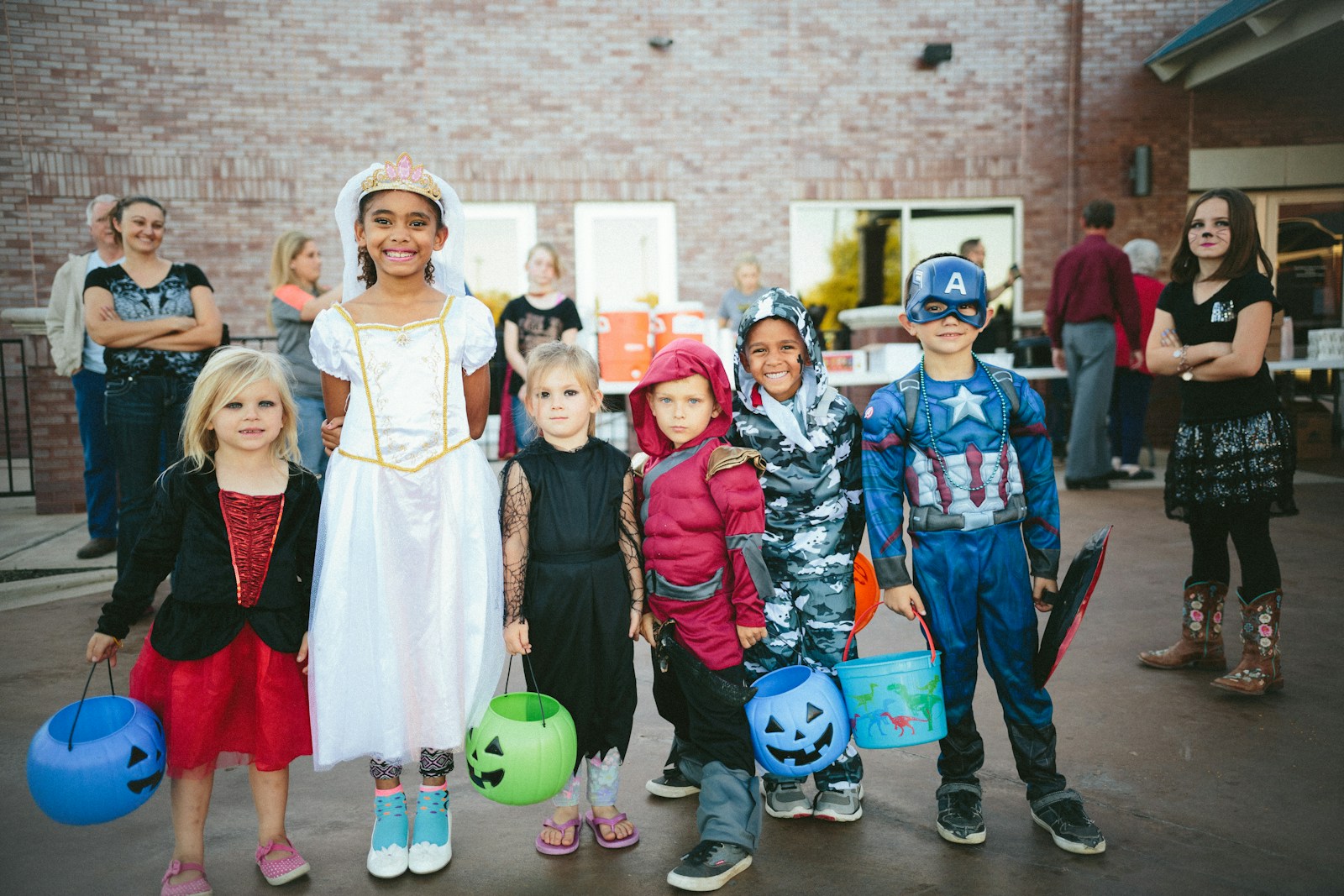 The Terror Passage in Guardamar Del Segura children standing while holding Jack 'o lantern and wearing costume