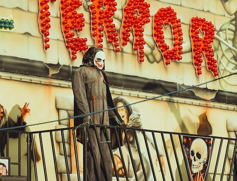Themed exhibition and Passage of Terror a group of people dressed up in costumes on a balcony