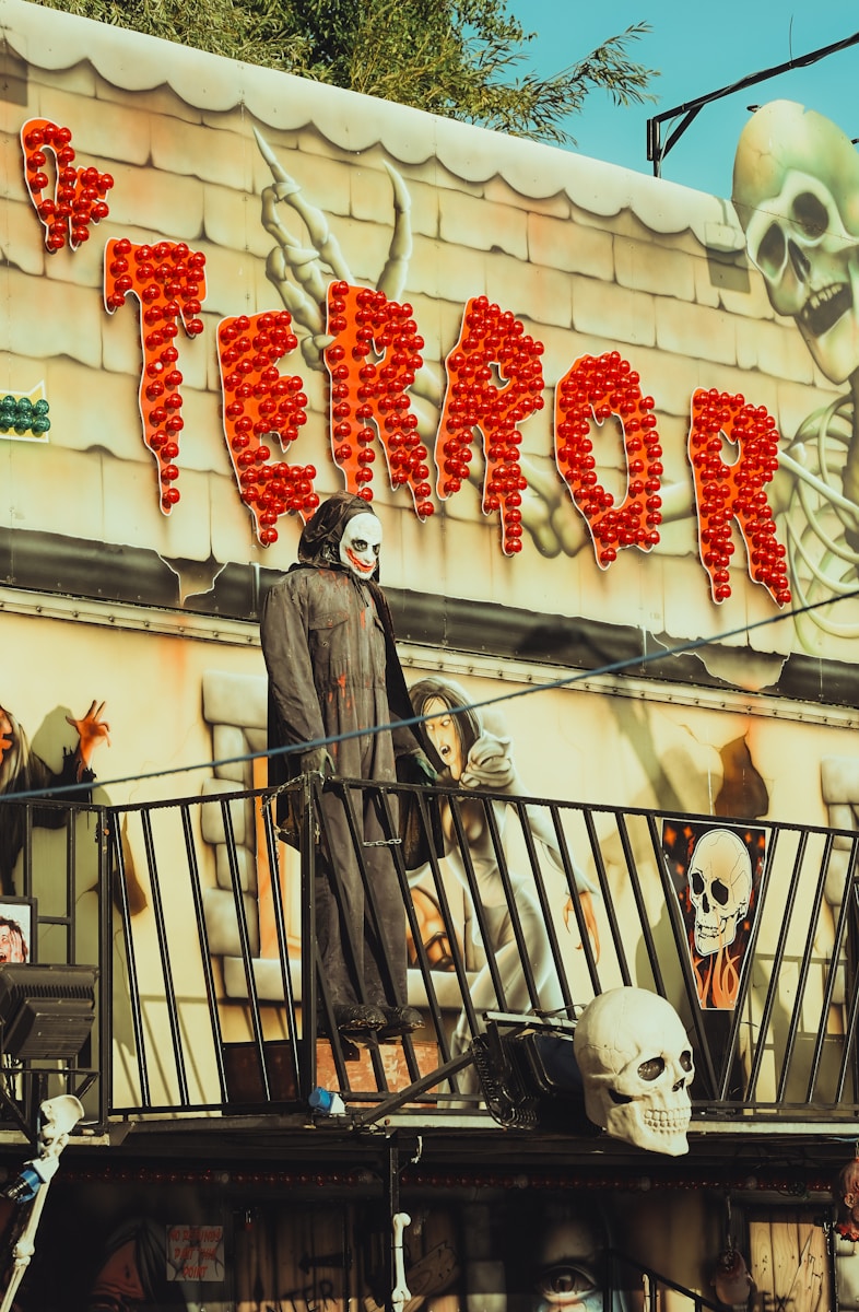 a group of people dressed up in costumes on a balcony