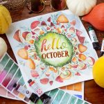yellow round fruit on white and red floral table cloth