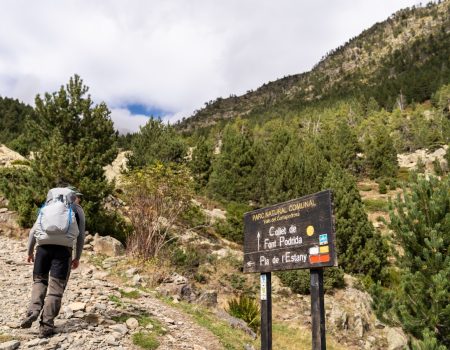 A Tale of Two Wheels and Two Feet: Exploring the Costa Blanca a person with a backpack walking up a hill