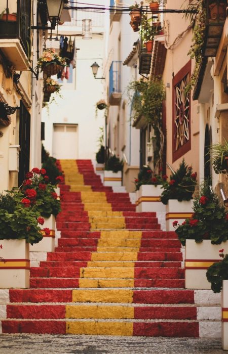 red, yellow, and white concrete stairs